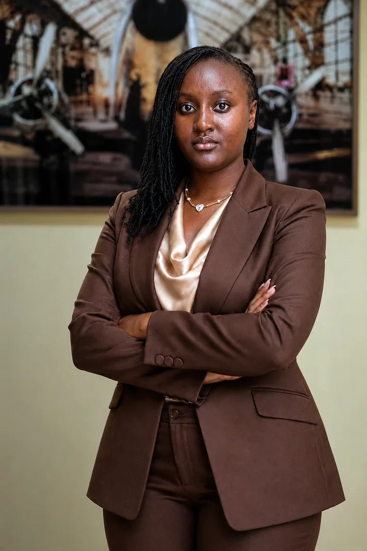 Faith Kerubo Ong’anyo in a business suit at her office